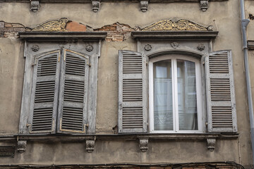 Architectural fragments of the design of an old French house in Toulouse Old town. Toulouse, Haute-Garonne, France.