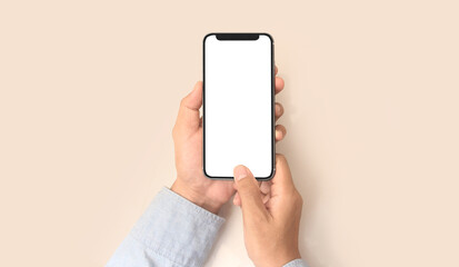 Hand holding smartphone device touching screen