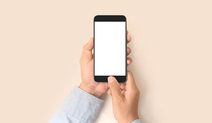 Hand holding smartphone device touching screen