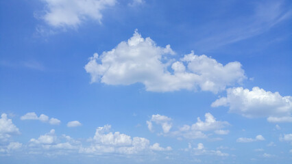 White clouds of various sizes Floating in the blue sky