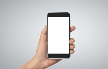 Hand holding smartphone device touching screen