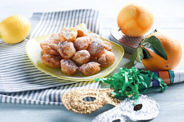 Fried pancakes with lemon and orange (ph. Archivio Collection)