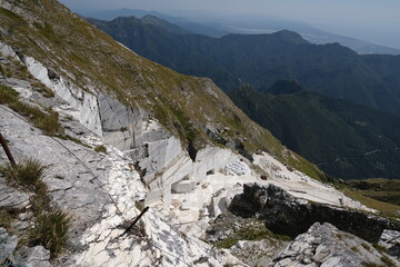 White marble quarries on Monte Corchia.Apuan Alps in Alta Versilia. On the mountain peaks, near Carrara, white marble is quarried. Alpi Apuane, Tuscany, Italy.