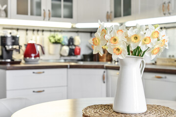 Bouquet of daffodils in interior of the kitchen