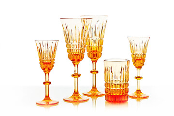 crystal colored glasses on white background