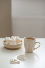 breakfast with a cup of coffee on a white table top view, flat lay