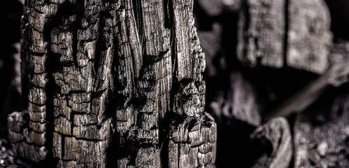 piece of charcoal in close up, charcoal texture