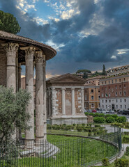 Rome Italy, Boario forum temple and square under dramatic sky and sun rays
