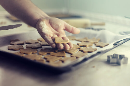 Cook making heart-shaped and flower-shaped cookies - Powered by Adobe