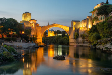 Stari Most bridge at night in old town of Mostar, BIH