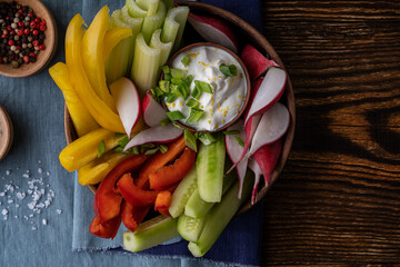 Keto diet snack platter with vegetable crudites and Greek yoghurt dipping sauce - obrazy, fototapety, plakaty