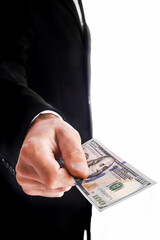 Business man holding money on white background