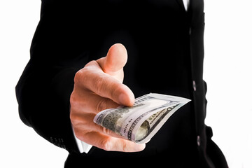 Business man holding money on white background