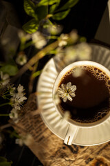 Coffee sun flowers wooden table white cup