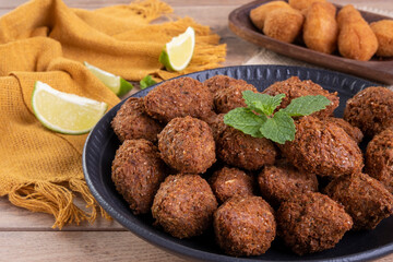 Brazilian fried savory snack mix with coxinha and fried kibbeh