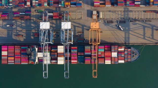 Time lapse Container , container ship in export and import business and logistics.