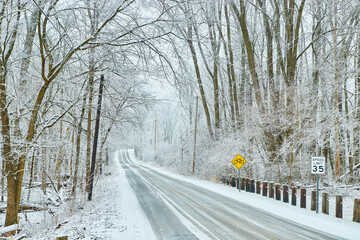 Snow covered road in winter © Nicholas J. Klein
