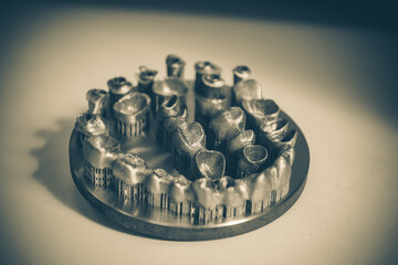 Object printed on metal 3d printer. Dental crowns