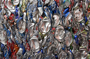 Compressed, crushed, smashed, flattened aluminum soda and beer cans for scrap metal recycling in the USA