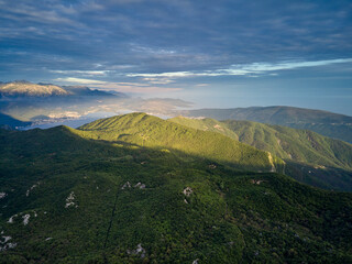 Panoramic view of the Bay of Kotor, Montenegro, with the mountains at sunset.
