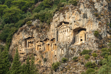 Fototapeta na wymiar Rock-cut temple tombs of the ancient city Kaunos in Dalyan, Turkey.