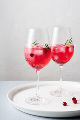 Cranberry rosemary spritzer drink.