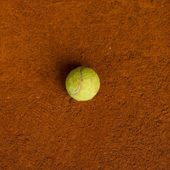 Top view of a tennis ball on the tennis court