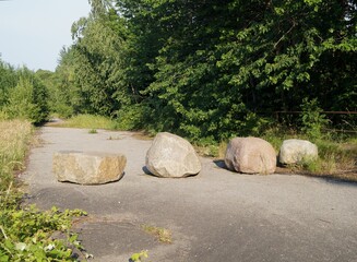 Four stones on an abandoned road 