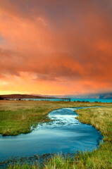 Fototapeta na wymiar sunrise over the river, Viedma lake, Lago Viedma, El Chalten, Patagonia, Argentina