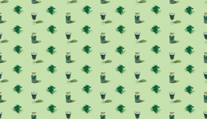 Seamless isometric pattern made of green spirulina algae powder and drink. Healthy nutrition concept.