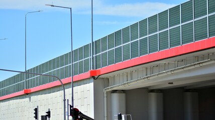 Obraz premium Safety barriers on the highway. Anodized safety steel barrier on freeway bridge.