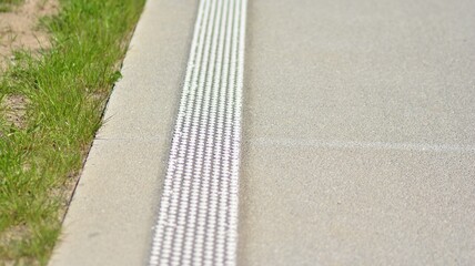 Obraz premium Straight modern concrete motorway with bright road marking. Transportation road system infrastructure. 