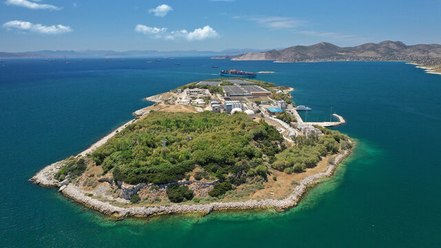 Aerial drone photo of latest technology sewage and sludge processing plant in small island of Psitalia or Psyttaleia, Piraeus, Attica, Greece