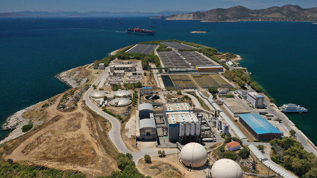 Aerial drone photo of latest technology sewage and sludge processing plant in small island of Psitalia or Psyttaleia, Piraeus, Attica, Greece