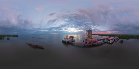 360 panorama by 180 degrees angle seamless panorama of aerial view of Wat Hong Thong with lake or...
