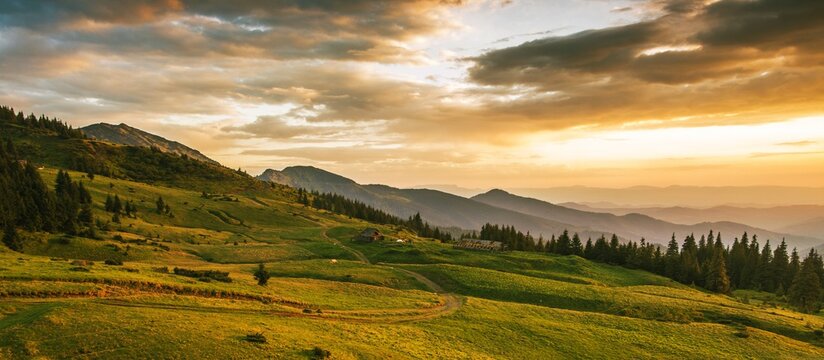 panoramic summer sunrise scenery, stunning landscape in the mountains, mountains hills and wonderful morning sky, 
