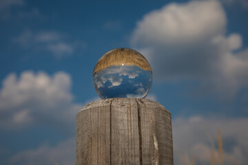 Glass bowl with clouds and grass