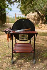 excellent portable barbecue made by hand in black.