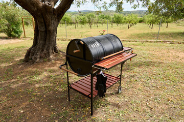 excellent portable barbecue made by hand in black.