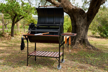 excellent portable barbecue made by hand in black.