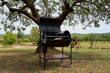 excellent portable barbecue made by hand in black.