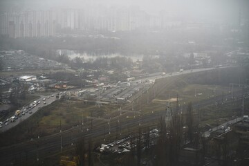 Railroad track, aerial view. View of the capital of Ukraine. Kyiv city during late fall and rainy weather.