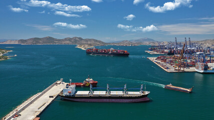 Fototapeta na wymiar Aerial drone photo of logistics and container terminal of Perama near commercial port of Piraeus, Attica, Greece