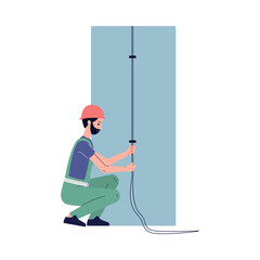 Professional male electrician worker perform electric works - installation wiring