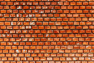 Red brick weathered wall background	