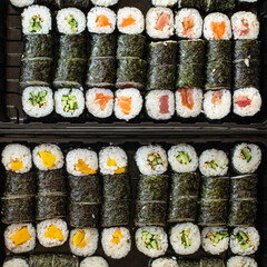 sushi roll seafood maki susi salmon, tuna, rice, nori, wasabi, sesame asian food meal snack copy space food background rustic top view