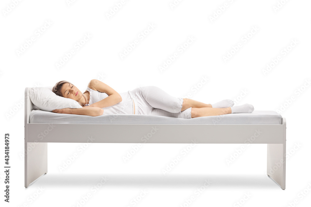 Sticker Woman in pajamas sleeping on a bed