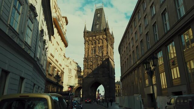 Powder Tower street view with historical urban architecture in Prague, Czech Republic. 