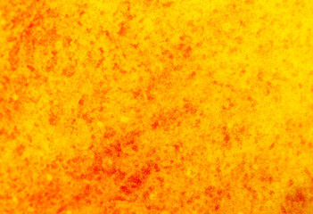 Close up photo of red apple background. Apples fruit peel texture, macro view. Beautiful natural wallpaper.