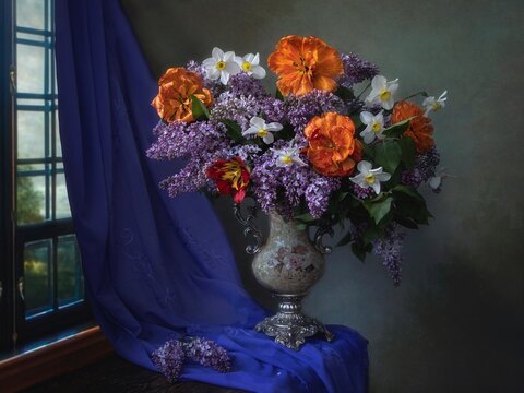 Still life with a luxurious bouquet in a vintage vase